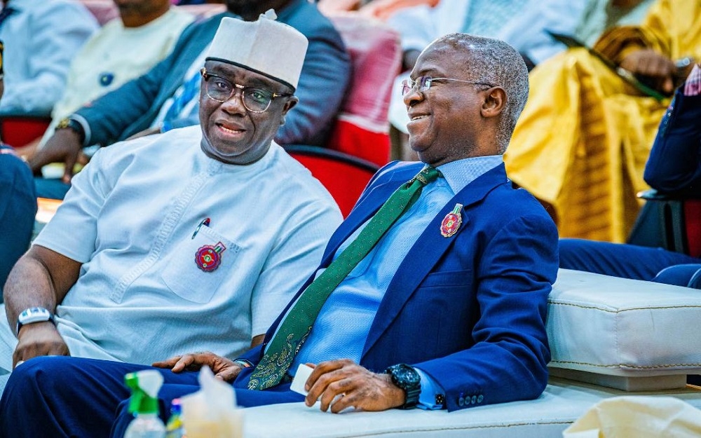 Representative of the President and Hon. Minister of Works and Housing, Mr Babatunde Fashola,SAN (right) and  Hon. Minister of State for Budget and National Planning, Mr  Clem Agba (left) during FERMA&#039;S 20th  Anniversary Conference , public presentation of the Book titled, &quot;FERMA&#039;s Firm Footprints in National Road Infrastructure Maintenance&quot; and Launch of FERMA&#039;s Short Code  at the NAF Conference Centre, Kado, Abuja on Thursday, 1st December 2022.