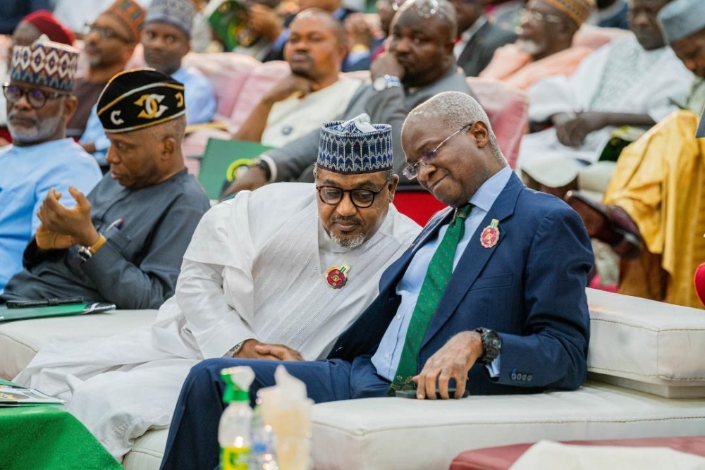 Representative of the President and Hon. Minister of Works and Housing, Mr Babatunde Fashola,SAN (right) and  Hon. Minister of State in the Ministry, Hon. Umar El- Yakub (left) during FERMA&#039;S 20th  Anniversary Conference , public presentation of the Book titled, &quot;FERMA&#039;s Firm Footprints in National Road Infrastructure Maintenance&quot; and Launch of FERMA&#039;s Short Code  at the NAF Conference Centre, Kado, Abuja on Thursday, 1st December 2022. 