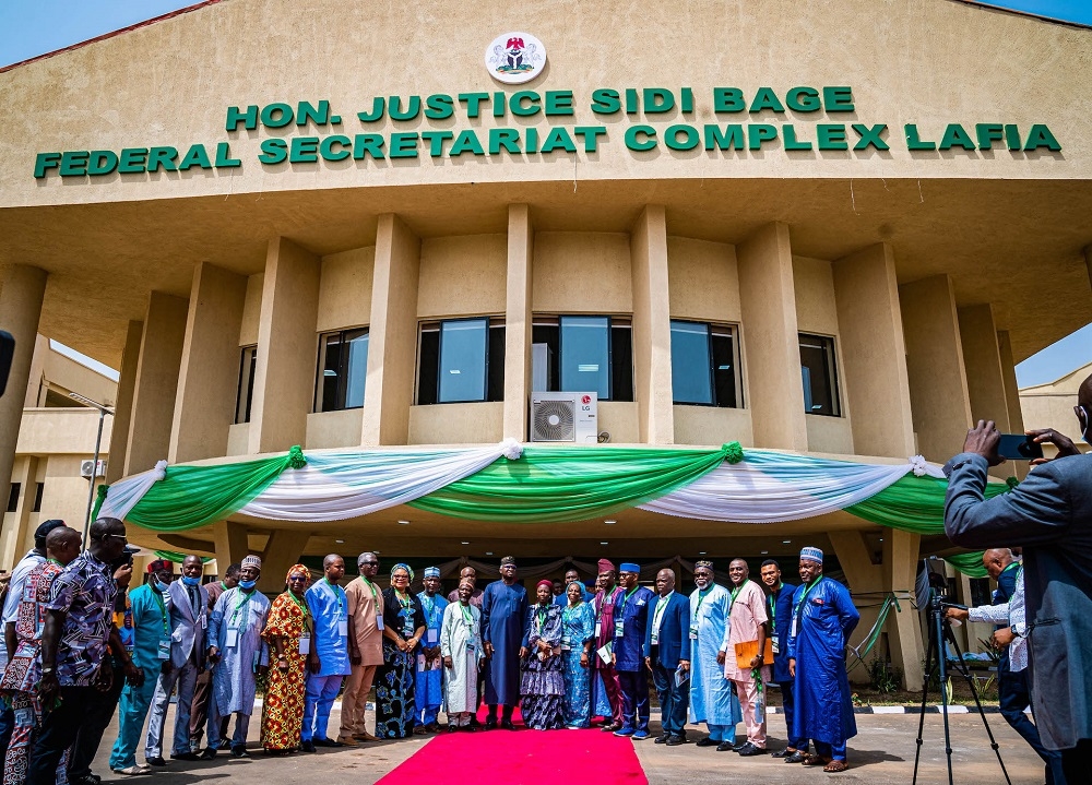 SEASON OF COMPLETION, COMMISSIONING AND IMPACT... Hon. Minister of Works and Housing, Mr. Babatunde Fashola, SAN (10th right), the Director, Public Buildings and Housing, Arc. Solomon Labafilo (10th left), some Directors in the Ministry and other members of the organising committee in a group photograph shortly after the Commissioning of the Federal Secretariat Complex named by President Muhammadu Buhari in honour of Emir of Lafia and Chairman, Nasarawa State Council of Chiefs, Hon. Justice Sidi Bage in Bukar Sidi, along Jos Road, Lafia, Nasarawa State on Saturday, 4th February 2023. 