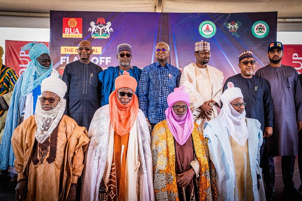 FROM SECOND ROW: Hon. Minister of Works and Housing, Mr. Babatunde Fashola, SAN (middle), Hon. Minister of Water Resources, Engr. Suleiman Adamu (3rd left), Minister of State in the Ministry, Hon. Umar El - Yakub(2nd right), representative of the Chairman, BUA Group, Alhaji kabiru Rabiu (3rd  right) and others  in a group photograph shortly after the  official Flag - off of the Dualization of the 132KM Kano - Daura - Kongollam Road in Kano, Jigawa and Katsina States  under the Federal Government Road Infrastructure Development and Refurbishment Tax Credit Scheme on Tuesday, 7th February 2023. 