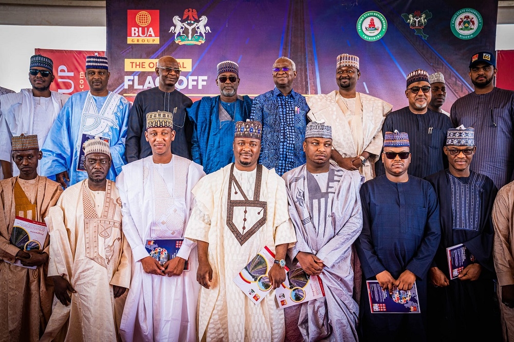 FROM SECOND ROW: Hon. Minister of Works and Housing, Mr. Babatunde Fashola, SAN (4th right), Hon. Minister of Water Resources, Engr. Suleiman Adamu (4th left), Hon. Minister of State , Works and Housing , Hon. Umar El - Yakub (2nd right), representative of the Chairman, BUA Group, Alhaji kabiru Rabiu (3rd  right) and the Management of BUA Group in a group photograph shortly after the  official Flag - off of the Dualization of the 132 KM Kano - Daura - Kongolam Road in Kano, Jigawa and Katsina States  under the Federal Government Road Infrastructure Development and Refurbishment Tax Credit Scheme on Tuesday, 7th February 2023.