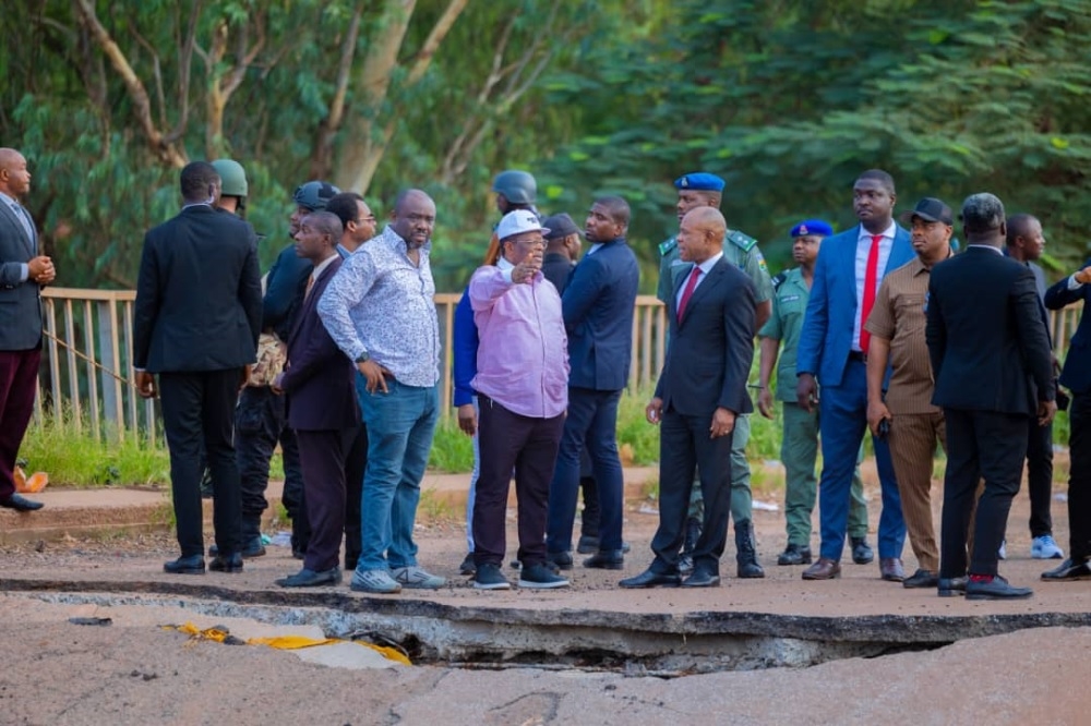 The Honourable Minister of Works, Sen. Engr David Umahi and the Executive Governor, Enugu State, H.E Peter Mbah during the inspection of the commencement of palliative works at the collapsed bridge at New Artisan Flyover/NNPC Mega Station along Enugu/PH Expressway , Enugu State.